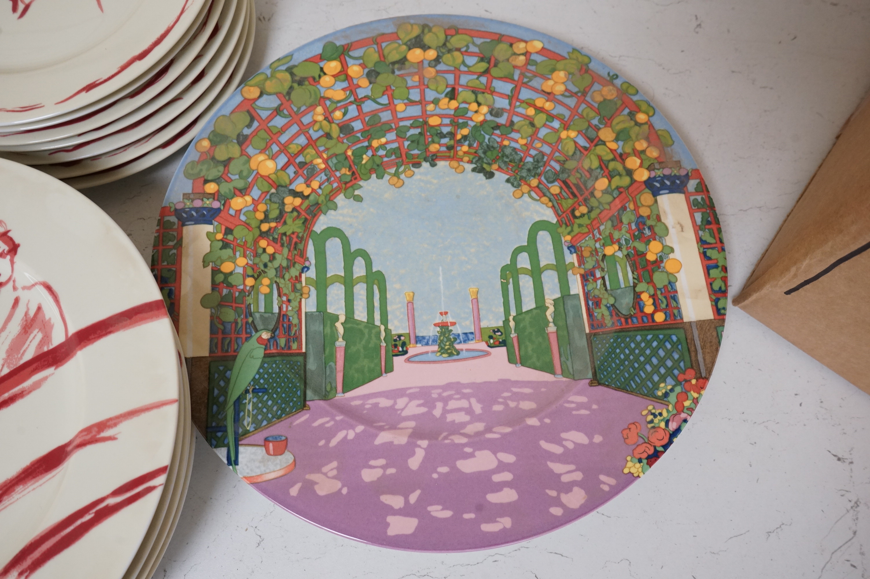 A Pierre Frey ‘Gonesse’ Limoges part dinner service, two Villeroy and Boch ‘Jardins Francais’ dinner plates, with a collection of Riedel wine glasses and mixed Salviati champagne glasses. Villeroy and Boch plates 30.5cm
